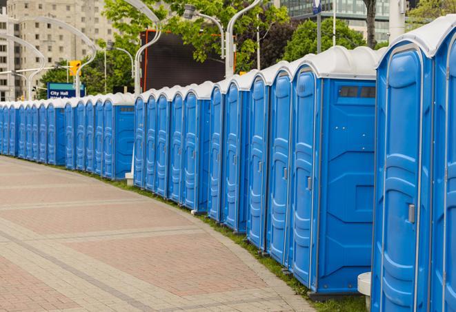 a row of portable restrooms at a fairground, offering visitors a clean and hassle-free experience in Allons, TN